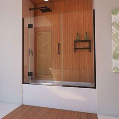 a bath room with a toilet and a stand up shower