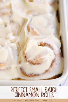 cinnamon rolls in a white dish with icing on top and the words perfect small batch cinnamon rolls