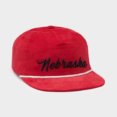 We referenced our favorite vintage hat designs and styles to create this simple – yet statement – corduroy Nebraska hat. Featuring the comfort of a dad hat and the structure of a snapback, this durable, retro-inspired cap is a vintage nod to the 'Huskers. Each corduroy hat is adjustable, and size ranges from cap sizes 7 to 7 3/4 (56 to 62 cm). Hats are 8cm from the top of the bill to the point of the crown. Corduroy Snapback Hat For Streetwear With Curved Brim, Corduroy Trucker Hat With Curved Brim For Streetwear, Corduroy Hat With Curved Brim For Streetwear, Vintage Curved Brim Hats For College, Vintage Corduroy Snapback Hat With Curved Brim, Vintage Corduroy Flat Brim Baseball Cap, Retro Corduroy Flat Bill Hat, Vintage Adjustable Corduroy Hat, Vintage Corduroy Snapback Trucker Hat