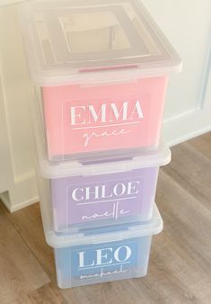 three plastic storage containers stacked on top of each other with the word ema printed on them