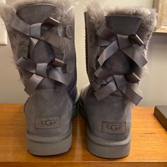 These Boots Were Only Worn A Couple Of Times! They Are In Excellent Shape:) Bow Uggs, Cute Uggs, Ugg Bailey Bow, Gray Boots, Bailey Bow Uggs, Shoes Ugg, Ugg Bailey, Bailey Bow, Grey Boots