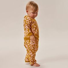 This essential sweatpant comes in 100% organic cotton French terry that your little one will never want to take off. The assortment of prints can be mixed and matched in fun and fantastic ways with almost anything in your wardrobe. These sweatpants features a kangaroo pocket for easy storage. Playful Cotton Sweatpants For Loungewear, Playful Cotton Sweatpants With Elastic Waistband, Cotton Sweatpants With Elastic Waistband For Playtime, Casual Organic Cotton Bottoms For Playtime, Playful Sweatpants With Elastic Waistband For Loungewear, Cotton Sweatpants For Spring Playwear, Unisex Cotton Bottoms For Loungewear, Playful Cotton Pants For Fall, Playful Relaxed Fit Sweatpants For Loungewear