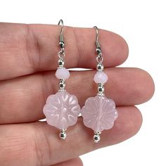 This listing is for one set of these lovely silver-plated rose quartz floral earrings with genuine rose quartz stone beads. Ear Wire options are: Stainless Steel: Hypoallergenic and tarnish resistant! Sterling Silver: Hypoallergenic Other options such as clip-ons for unpierced ears, and closed lever backs are available upon request! ~~IMPORTANT~~ Be sure to double-check the shipping address before placing an order. Once orders have been shipped out, I cannot do anything to change the address. I Silver Dangle Flower Earrings Feminine, Pink Rose Quartz Earrings With Natural Stones, Feminine Silver Dangle Flower Earrings, Pink Rose Quartz Earrings Gift, Pink Rose Quartz Earrings For Gifts, Elegant Nickel-free Rose Quartz Earrings, Pink Sterling Silver Hypoallergenic Flower Earrings, Pink Sterling Silver Flower Earrings Nickel Free, Pink Nickel-free Flower Earrings For Mother's Day