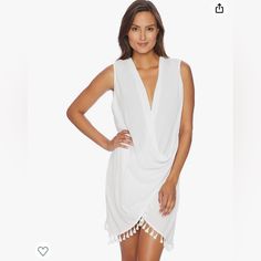 Brand: Athena Size: Medium Color: White Condition: New With Tags Can Be Worn As A Wrap Dress Or Open. Be Sure To Check Out The Other Swim Items I Have Listed For A Bundle! White Flowy V-neck Beach Dress, White Flowy V-neck Cover-up, White V-neck Dress For Poolside, White V-neck Poolside Dress, Chic White V-neck Cover-up, White V-neck Mini Dress For Poolside, Flowy White Mini Dress For Beach Cover-up, White Sleeveless Party Cover-up, White One-piece Dress For Poolside