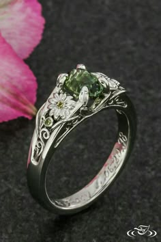 Green Flower Engagement Ring, Cottagecore Aesthetic Wedding Ring, Green Wedding Ring Aesthetic, Custom Design Engagement Ring, Cute Wedding Rings Aesthetic, Wedding Ring Flower Design, Midevil Engagement Rings, Bug Wedding Rings, Green Lake Jewelry Works