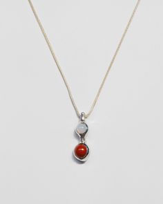 Red jasper and blue chalcedony nestled in a sculptural solid brass or sterling silver setting. Sterling silver chain is adjustable from 18-20 inches, closes with a lobster clasp. Pendant measures 1.25" from top to bottom, just under .5" wide. Availability: Made to order, ships in 2-4 weeks. Need it sooner? Don't hesitate to get in touch and we'll do our best to accommodate. Silver Carnelian Pendant Necklace, Red Oval Sterling Silver Necklace, Oval Sterling Silver Necklace With Lobster Clasp, Red Carnelian Oval Pendant Necklaces, Elegant Carnelian Jewelry With Large Pendant, Handmade Red Chalcedony Jewelry, Red Carnelian Oval Pendant Necklace, Red Jewelry With Large Oval Pendant, Adjustable Gemstone Necklace With Oval Pendant