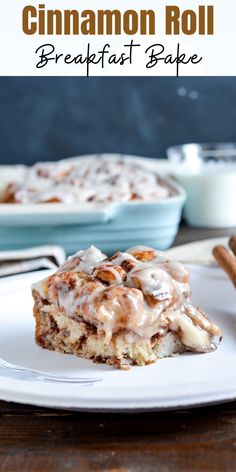 cinnamon roll breakfast bake on a white plate with cinnamon sticks in the foreground