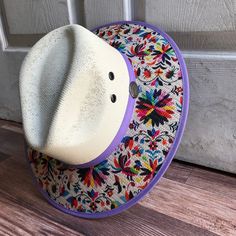 This beautiful Mexican Sombrero has would be perfect to add that special touch to any outfit. MADE IN MEXICO By: Mexican Artisans For: Women Size: Medium 23' Color: off-white | multi Details: Material: palm straw Fabric canvas design Bottom brown suede Inner elastic band Contact us for more details PLEASE READ BEFORE PURCHASE: The picture is an ACCURATE REPRESENTATION.Colors in the pictures may vary a little by effects of light. Each product is handmade from Mexico causing differentiation and mi Multicolor Wide Brim Panama Hat In Toquilla Straw, Multicolor Toquilla Straw Fedora Hat, Multicolor Toquilla Straw Fedora, Wide Brim Straw Hat For Cinco De Mayo Festival, Multicolor Fedora Hat In Toquilla Straw, Wide Brim Beach Hat For Cinco De Mayo, Wide Brim Hats For Beach And Cinco De Mayo, Multicolor Toquilla Straw Fedora Sun Hat, Multicolor Toquilla Straw Summer Panama Hat