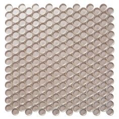 a white tile with circles on it