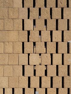 a brick wall that has been made into a pattern with squares and rectangles