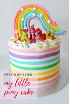 a birthday cake with rainbow frosting and pink pineapple cakes my little pony cake