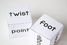 two cubes with words that spell out the word twist, point, and grow