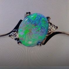 Blue Opal Looking Ring Size 7 Brand New. Elegant Blue Opal Ring, Pave Wedding Rings, Twisted Band Ring, White Opal Ring, Pear Ring, Garnet Crystal, Flower Engagement Ring, Twisted Band, Pink Topaz