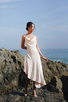 Tie one on with our Benny bridesmaid silk dress, featuring a minimalist tank front, playful draped neckline and bias cut asymmetrical skirt, her body-skimming silhouette hugs in all the right places. This Jenny Silk Dress is set to take the top spot. Draped Neckline, Misty Rose, Wedding Bridal Party, Bridal Party Dresses, Silk Midi Dress, Asymmetrical Skirt, Dress 16, White Silk, Asymmetrical Dress