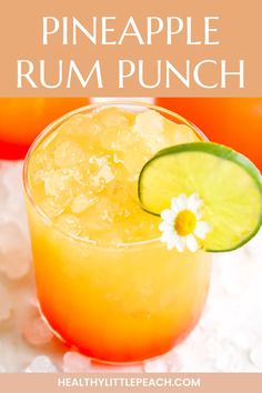 the pineapple rum punch is garnished with a flower