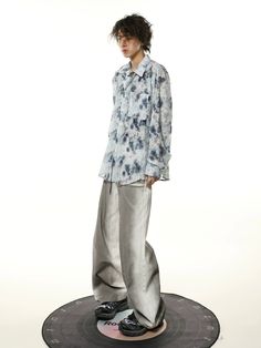 Make a statement with the Abstract Pastel Floral Print Oversized Shirt, where comfort meets an artistic edge.
Crafted with a smooth, lightweight fabric, this long-sleeved shirt showcases an all-over floral print in soft pastel hues. It's designed with a relaxed oversized cut, making it a breezy choice for those looking to combine casual with a touch of sophistication. The thoughtful tailoring includes a conventional collar, giving it a structured yet nonchalant silhouette that captures an understated yet impactful style.
This versatile shirt lends itself to a variety of looks, perfect for a laid-back weekend or a casual day at the office. It pairs effortlessly with slim-fit trousers or your favourite denim for an easy-going, yet polished ensemble. Embrace a fusion of retro and modern sensi Oversized Long Sleeve Shirt With Abstract Print, Spring Long Sleeve Shirt With Abstract Print, Oversized Long Sleeve Printed Blouse, Oversized Printed Long Sleeve Blouse, Oversized Floral Print Shirt For Fall, Oversized Floral Print Top For Daywear, Oversized Printed Spring Blouse, Oversized Printed Blouse For Spring, Spring Oversized Printed Blouse