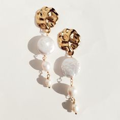 Beautiful and Unique Baroque Pearl Drop Earrings are perfect for an elegant look, they are made of Baroque Pearls and set on 18k gold plated stainless steel studs. I'm obsessed with this statement design. They are perfect for a bridal/wedding/special occasion. Light-weight DesignSold in pairDETAILSWater Resistant- skin-friendlyLength 3 inch Chic Tarnish-resistant Wedding Jewelry, Glamorous Gold Plated Earrings For Weddings, Glamorous Gold Plated Wedding Earrings, White Gold-plated Pierced Pearl Earrings, White Gold Plated Pierced Pearl Earrings, Chic Pearl Drop Chandelier Earrings For Gift, Elegant Gold Plated Plug Earrings, Chic Chandelier Earrings With Pearl Drop, Chic Chandelier Earrings With Pearl Drop As Gift