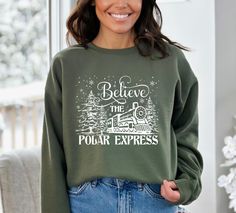 Believe the Polar Express Sweatshirt, Christmas Family Trip Sweatshirt, Matching Christmas ✔️ Crafted using advanced DTF technology and a professional-grade heat press, our shirts are designed for ultimate comfort with high quality and super soft materials. 👉 HOW TO PLACE AN ORDER? * Review the size, color, and theme of the images in this listing. * Select your preferred size and shirt color from the menus. * Complete the empty box with your desired design color for personalization. Refer to th Christmas North Pole, The Polar Express, Christmas Hoodie, Polar Express, Christmas Hoodies, Sweatshirt Christmas, Family Trip, Christmas Family, Soft Air