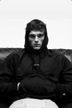 Jacob elordi in hoodie over his head and calvin klein underwear Liam Hemsworth