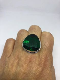 Large brilliant emerald green antique glass Ornate German Silver NOT 925 Vintage ring, does not tarnish Size 7 can be re sized, my jeweler charges a $10 - $15 fee All rings are shipped free in the US in a nice gift box. Check out our over a THOUSAND great reviews Engraving is $4 per letter and is not always perfect depending on the piece. It can take a few days if the jeweler is busy. This is payable to Paypal Judithsltd@gmail.com Round Emerald Party Ring, Green Emerald Crystal Ring, Unique Green Emerald Ring For Formal Occasions, Oval Green Crystal Sterling Silver Ring, Green Oval Crystal Ring In Sterling Silver, Sterling Silver Rings With Large Green Stone, Green Open Ring For Jewelry Making, Sterling Silver Ring With Large Green Stone, Formal Faceted Emerald Ring