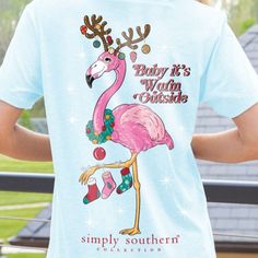 Get into the holiday spirit with a tropical twist! This Simply Southern "Baby It's Warm Outside" t-shirt features a fun and festive flamingo with antlers, decked out in Christmas decorations. Perfect for warm winter getaways or celebrating the season in style, this short sleeve tee brings the best of holiday cheer with a playful touch. Made from soft, breathable fabric, it’s the perfect combination of comfort and quirky holiday charm. Show off your love for unique, whimsical designs and keep thi Winter Getaways, Flamingo Shorts, Southern Baby, Southern Women, Tropical Twist, Winter Getaway, Simply Southern, Christmas Baby, Merry And Bright