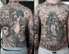 the back of a man with tattoos on his body