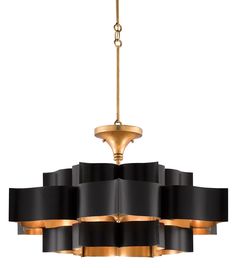 a black and gold chandelier hanging from the ceiling