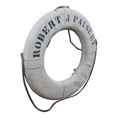 a white life preserver with the word robert j paisier written on it