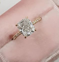 2.50 Ct Cushion Cut Moissanite Engagement Ring, Cushion Cut Ring, Elongated Cushion, Hidden Halo Luxury Ring for Her ✥ 𝐌𝐚𝐢𝐧 𝐒𝐭𝐨𝐧𝐞 𝐃𝐞𝐭𝐚𝐢𝐥𝐬 ↣ Shape: Cushion Cut ↣ Type: Moissanite ↣ Weight: 2.50 Ct (App.) ↣ Color: Colorless ↣ Clarity: VVS ↣ Making Process: Handmade - Crafted by our experienced team ✥ 𝐑𝐢𝐧𝐠 𝐃𝐞𝐭𝐚𝐢𝐥𝐬 ↣ Band Width: 1.6 mm (± 0.10) [Customization Possible] ↣ Metal Purity: Solid Gold (10KT, 14KT, 18KT); Silver (925 Sterling), 950 Platinum ↣ Metal Tone: Yellow, White, Rose ↣ Stamp/Hallmark: Yes ❁❁ 𝐉𝐞𝐰𝐞𝐥𝐫𝐲 𝐂𝐞𝐫𝐭𝐢𝐟𝐢𝐜𝐚𝐭𝐞 ❁❁ ↣ Lucid Gems Studio branded authenticate Jewelry Certificate comes with the authenticity of Metal, Moissanite, and Gemstone combination. ↣ The certificate comes with Limited Lifetime Warranty details. ↣ Listed Jewelry come Dazzling Rectangular Diamond Ring For Anniversary, Rectangular Moissanite Ring In Fine Jewelry Style, Rectangular Vs Clarity Diamond Ring Fine Jewelry, Rectangular Moissanite Ring Fine Jewelry, Dazzling Rectangular Rings With Prong Setting, Rectangular Diamond Ring For Proposal, Rectangular Moissanite Rings For Anniversary, Brilliant Cut Moissanite Diamond Ring In Rectangular Shape, Rectangular Brilliant Cut Moissanite Diamond Ring