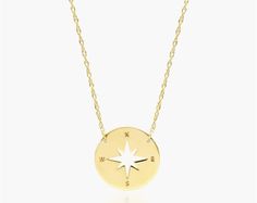 14K Yellow Gold Mini Compass Adjustable Necklace. Always be looking in a stylish direction when you wear this gorgeous necklace. Whether for yourself or a loved one, this necklace makes the perfect gift. Luxury Gold Necklace With Compass Design, Elegant Necklace With Compass Design For Gift, Elegant Compass Design Necklaces As Gift, Sterling Silver Yellow Gold Compass Design Necklace, Sterling Silver Gold Necklace With Compass Design, Silver 14k Gold Necklace With Compass Design, Sterling Silver Yellow Gold Necklace With Compass Design, 14k Gold Silver Necklace With Compass Design, Luxury Compass Design Necklace As Gift