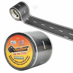 a roll of duct tape next to a canister on the side of a road