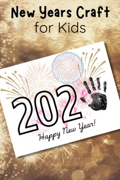 a happy new year's card for kids with fireworks and handprint on it