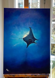 a painting of a manta ray swimming in the ocean