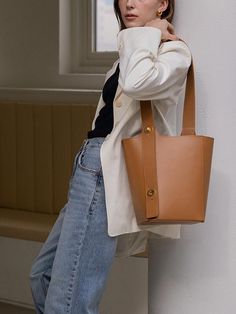 For unique designs and high-quality products, REFRAME pursues craftsmanship through the entire domestic handmade process.- Two-way bucket bag made of Italy leather- Can be worn in two ways: shoulder or cross bag- Gold satin turn lock and saltledge decoration- Durable bag with generous size Light Brown Bucket Shoulder Bag With Large Capacity, Light Brown Large Capacity Bucket Shoulder Bag, Light Brown Shoulder Bucket Bag For Shopping, Leather Bucket Hobo Bag For Office, Cognac Leather Bucket Bag For Work, Light Brown Bucket Bag With Adjustable Strap For Shopping, Camel Bucket Bag For Travel, Light Brown Bucket Shoulder Bag For Shopping, Light Brown Crossbody Bucket Bag With Adjustable Strap