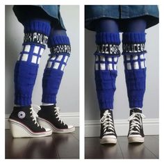 the legs and ankles of two people wearing socks with words written on them, both in blue