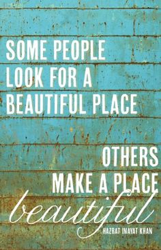 some people look for a beautiful place others make palace beautiful quote on blue brick wall