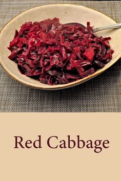 red cabbage in a bowl with a spoon on the side and text overlay reading red cabbage