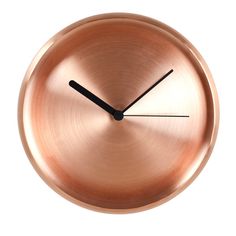 an image of a clock that is on the wall or floor in copper color with black hands