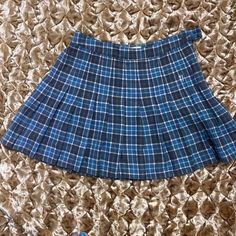 This Is An Adorable Blue Plaid Skirt. This Doesn’t Fit Me And Just Trying To Pass It On. Waist: 14inches Size Small Blue Y2k Skort For Spring, Y2k Style Blue Skort For Spring, Blue Y2k Style Skort For Spring, Y2k Blue Cotton Mini Skirt, Blue Cotton Y2k Skort, Blue Cotton Y2k Style Skort, Y2k Style Pleated Skirt Bottoms For School, Y2k Style Blue Cotton Skort, Y2k Style School Pleated Skirt