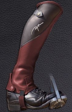 an artistic rendering of a pair of boots with the foot covered in leather and metal