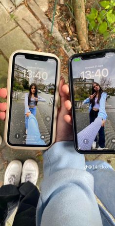 two people holding up their cell phones with pictures on them