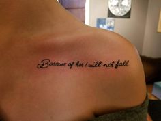 the back of a woman's shoulder with a tattoo saying, because of her will not fall