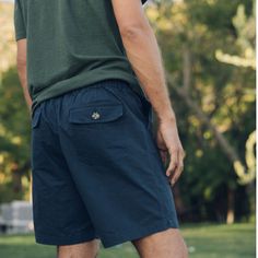 Mollusk: Salvador Shorts - Navy A favorite pants, now short(er). Same business up front and party in the back. The Salvador Shorts take a note from a classic military style with front and back patch pockets, but stand alone with an elastic back waistband. DETAILS: 100% Cotton Preshrunk Inseam length is 7" on all sizes Manufactured at a socially and environmentally responsible factory in India *Machine wash, warm gentle cycle. Only non-chlorine bleach when needed. Tumble Dry Low. Warm iron if nee Casual Bottoms With Side Pockets, Casual Bermuda Shorts With Side Pockets, Casual Short Pants With Side Pockets, Navy Bottoms With Pockets For Outdoor, Navy Shorts With Pockets For Summer, Summer Bermuda Pants With Cargo Pockets, Casual Outdoor Bottoms With Short Legs, Utility Bottoms With Hip Pockets For Summer, Casual Short Leg Bottoms For Outdoor