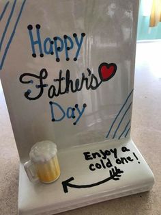 a father's day sign with a pint of beer