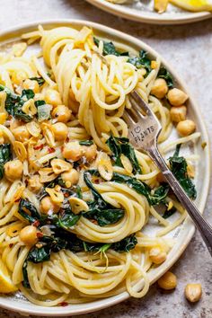 pasta with spinach and chickpeas on a plate