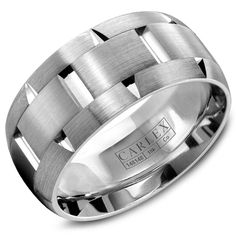 a men's wedding band in white gold with an intertwined design on the center