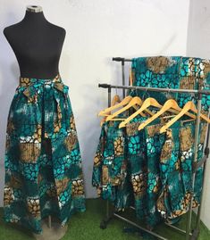 African Fabric Long Split Skirt.  Authentic made in Nigeria Ankara Material Long Skirt with side pockets. Can be worn casually or dressed up. Available in Small, Medium, Large and XL as displayed. Green Tiered Skirt With Pockets, Green Full Maxi Skirt With Pockets, Long Split Skirt, Ankara Material, Split Rock, Womens Skirts, Langer Rock, Handmade African, Split Skirt