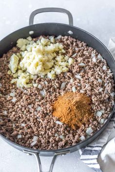 the ingredients to make this dish include ground beef, onions and spices in a skillet