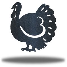 a turkey cutout with the letter e in it's center and an image of a