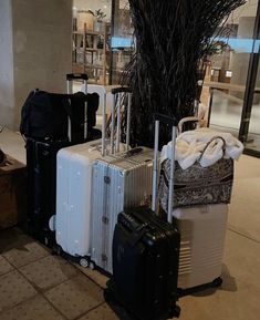 several pieces of luggage sitting on the ground